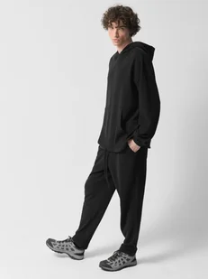 Męskie spodnie dzianinowe Outhorn OTHWSS24TTROM1050 - czarne - Spodnie męskie - miniaturka - grafika 1