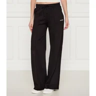 Dresy damskie - GUESS ACTIVE Spodnie dresowe CARMEN Loose fit - miniaturka - grafika 1