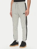Spodnie sportowe męskie - adidas Spodnie dresowe Essentials 3-Stripes JE6318 Szary Regular Fit - miniaturka - grafika 1