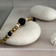 Bransoletki - Bransoletka na gumce - Hematyt Złoty Fasetowany z Onyksami i Perłami - miniaturka - grafika 1