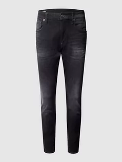 Spodnie męskie - Jeansy o kroju skinny fit z naszywką z logo - grafika 1