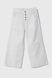 Spodnie i spodenki dla dziewczynek - Guess spodnie bawełniane dziecięce kolor biały gładkie - grafika 1