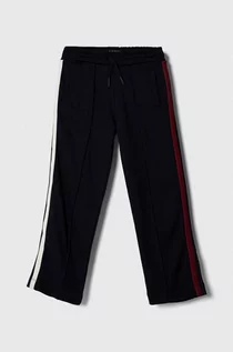 Spodnie i spodenki dla dziewczynek - Tommy Hilfiger spodnie dresowe dziecięce kolor granatowy wzorzyste - grafika 1