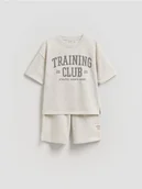 Spodnie i spodenki dla chłopców - Reserved - Bawełniany komplet - jasnoszary - miniaturka - grafika 1