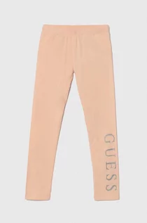 Spodnie i spodenki dla dziewczynek - Guess legginsy dziecięce kolor pomarańczowy z nadrukiem - grafika 1