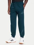 Spodnie sportowe męskie - adidas Spodnie dresowe Z.N.E. JW4724 Zielony Loose Fit - miniaturka - grafika 1