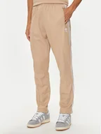 Spodnie sportowe męskie - adidas Spodnie dresowe adicolor Classics Beckenbauer IZ1857 Beżowy Slim Fit - miniaturka - grafika 1