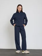 Spodnie sportowe damskie - BGN Spodnie dresowe w kolorze granatowym - miniaturka - grafika 1