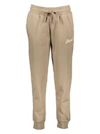Spodnie sportowe damskie - Puma Spodnie dresowe "Essentials+" w kolorze beżowym - miniaturka - grafika 1