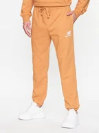 Spodnie sportowe męskie - New Balance Spodnie dresowe MP31539 Żółty Regular Fit - miniaturka - grafika 1