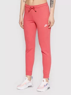 Spodnie sportowe damskie - Nike Spodnie dresowe Essential BV4099 Różowy Slim Fit - grafika 1
