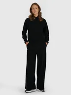 Spodnie sportowe damskie - 4F Spodnie oversize z szerokimi nogawkami damskie - czarne L - miniaturka - grafika 1