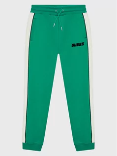 Odzież sportowa dziecięca - Guess Spodnie dresowe L2BQ19 KBGQ2 Zielony Regular Fit - grafika 1