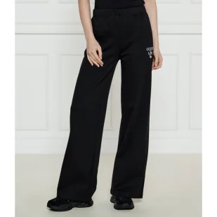 GUESS ACTIVE Spodnie dresowe ROBERTA flare fit - Dresy damskie - miniaturka - grafika 1
