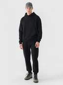 Spodnie sportowe męskie - Męskie spodnie dresowe Outhorn OTHWAW24TTROM1090 - czarne - miniaturka - grafika 1