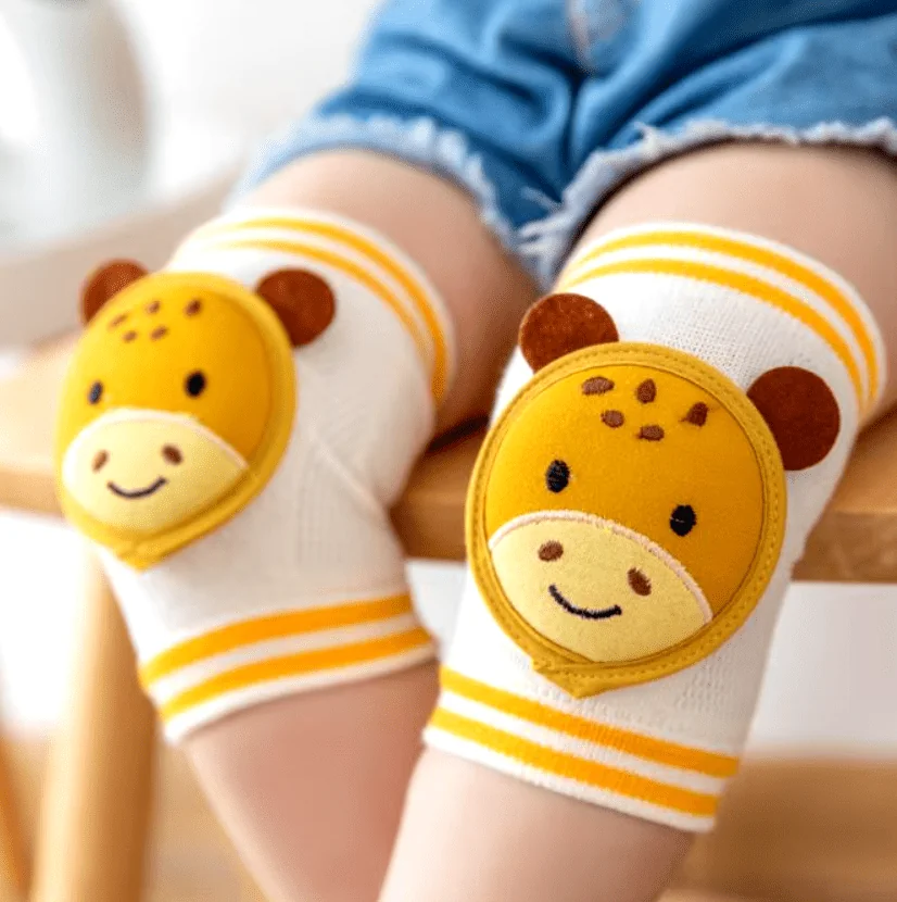 Antypoślizgowe nakolanniki dziecięce Mommy Bag Żyrafy - żółte