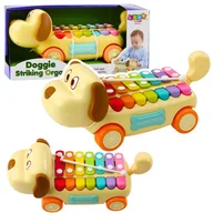 Zabawki interaktywne dla dzieci - Jeżdżący Piesek Cymbałki Ruchome Uszy Ogon Pałeczka Na Sznurku LEAN Toys - miniaturka - grafika 1