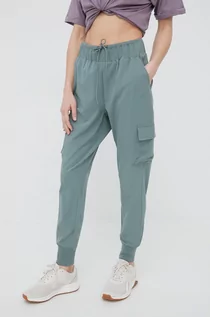 Spodnie damskie - 4F spodnie damskie kolor zielony joggery high waist - grafika 1
