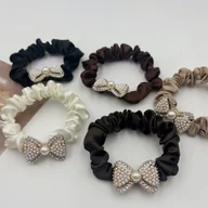 Ozdoby do włosów - TEMU 5 szt. Gumki do Włosów z Cyrkoniami i Kokardkami - Elastyczne Bezuszkodzeniowe Opaski, Perły Sztuczne & Ozdoby, 5 Kolorów (Brązowy, Ciemny Brąz, - miniaturka - grafika 1