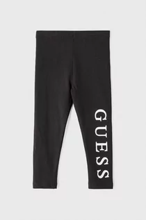 Spodnie i spodenki dla dziewczynek - Guess Legginsy dziecięce kolor czarny z nadrukiem - grafika 1