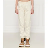 Spodnie sportowe damskie - Guess Spodnie dresowe Regular Fit - miniaturka - grafika 1