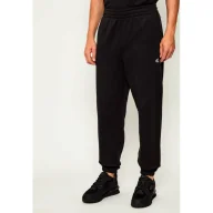 Dresy męskie - Calvin Klein Jeans Spodnie dresowe Regular Fit - miniaturka - grafika 1