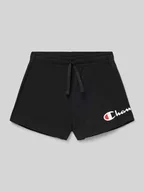 Spodnie i spodenki dla dziewczynek - Szorty z dzianiny dresowej o kroju regular fit z nadrukiem z logo - miniaturka - grafika 1