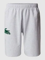 Spodnie sportowe męskie - Szorty z dzianiny dresowej z nadrukiem flokowym z logo - miniaturka - grafika 1