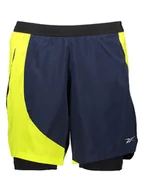 Spodenki męskie - Reebok Szorty w kolorze granatowo-żółtym do biegania - miniaturka - grafika 1