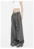 Spodnie damskie - Szerokie wiązane damskie spodnie z plisami - Szary - miniaturka - grafika 1