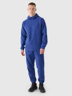 Spodnie sportowe męskie - 4F Spodnie dresowe joggery męskie - granatowe XL - miniaturka - grafika 1