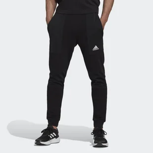 Spodnie męskie adidas Essentials BrandLove French Terry - Spodnie sportowe męskie - miniaturka - grafika 1
