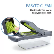 Pojemniki na przyprawy - Kuchenna krajalnica do warzyw w kolorze ZIELONYM - Regulowana multi krajalnica Uniwersalna krajalnica z różnymi przystawkami do krojenia, obierania,.. - miniaturka - grafika 1