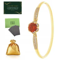 Bransoletki - ELEGANCKA BRANSOLETKA ZŁOTA DAMSKA SZTYWNA Z CZERWONYM KAMIENIEM, CYRKONIE - miniaturka - grafika 1