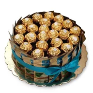Zestawy upominkowe - Tort ze słodyczy na prezent z cukierkami Ferrero Rocher i cejlońska czarna herbatą Dilmah Ceylon Gold (średnica 22 cm) - miniaturka - grafika 1