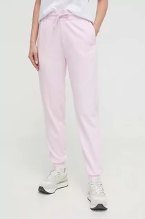 Spodnie damskie - adidas spodnie dresowe kolor różowy z nadrukiem - grafika 1