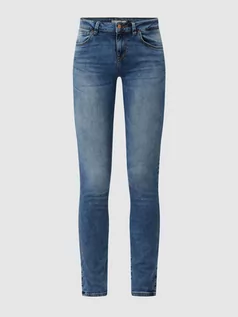 Spodnie damskie - Jeansy o kroju super skinny fit z dodatkiem streczu model ‘Nicole’ - grafika 1
