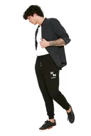 Dresy męskie - TRENDYOL MAN MĘSKIE SPODNIE DRESOWE CZARNE Z NADRUKIEM I MANKIETEM L 5DA - miniaturka - grafika 1