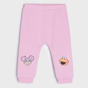 Spodnie i spodenki dla dziewczynek - Sinsay - Spodnie haremki Ulica Sezamkowa - Różowy - miniaturka - grafika 1