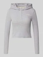 Bluzki damskie - Bluzka o kroju slim fit z długim rękawem, kapturem i wyhaftowanym logo - miniaturka - grafika 1