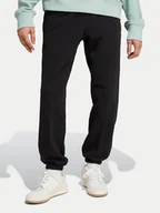 Spodnie sportowe męskie - adidas Spodnie dresowe Premium Essentials IY2245 Czarny Loose Fit - miniaturka - grafika 1