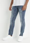 Spodnie męskie - Niebieskie Jeansy Skinny z Przetarciami i Dziurami Leonia - miniaturka - grafika 1