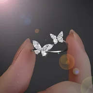 Inne - TEMU Pierścionek wykonany ze srebra próby 925, hipoalergiczny, z motywem motyla z syntetycznymi cyrkoniami. - miniaturka - grafika 1