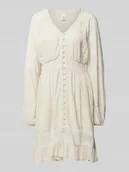 Sukienki - Sukienka o długości do kolan z koronkowym obszyciem model ‘REZA’ - miniaturka - grafika 1