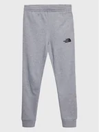 Moda i Uroda OUTLET - The North Face Spodnie dresowe Teen NF0A82EO Szary Regular Fit - miniaturka - grafika 1