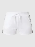 Spodnie sportowe damskie - Szorty z dzianiny dresowej o kroju regular fit z detalami z logo - miniaturka - grafika 1
