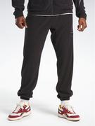 Spodnie sportowe męskie - Reebok Spodnie dresowe Reebok Basketball Court Top Joggers IA2426 Czarny Regular Fit - miniaturka - grafika 1