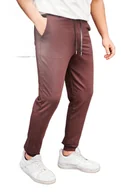 Dresy męskie - TRENDYOL MAN MĘSKIE SPODNIE DRESOWE BRĄZOWE Z MANKIETEM I WIĄZANIEM S 5DA - miniaturka - grafika 1