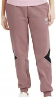 Spodnie sportowe damskie - ﻿Spodnie dresowe damskie Puma Rebel Pants S różowe - miniaturka - grafika 1