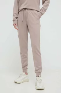 Spodnie damskie - Armani Exchange spodnie dresowe kolor beżowy gładkie - grafika 1